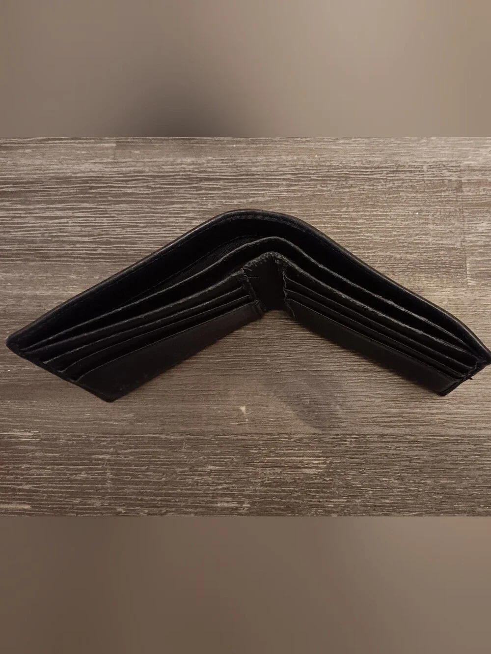 Gucci Black Leather Bifold Wallet with Silver GG Accent